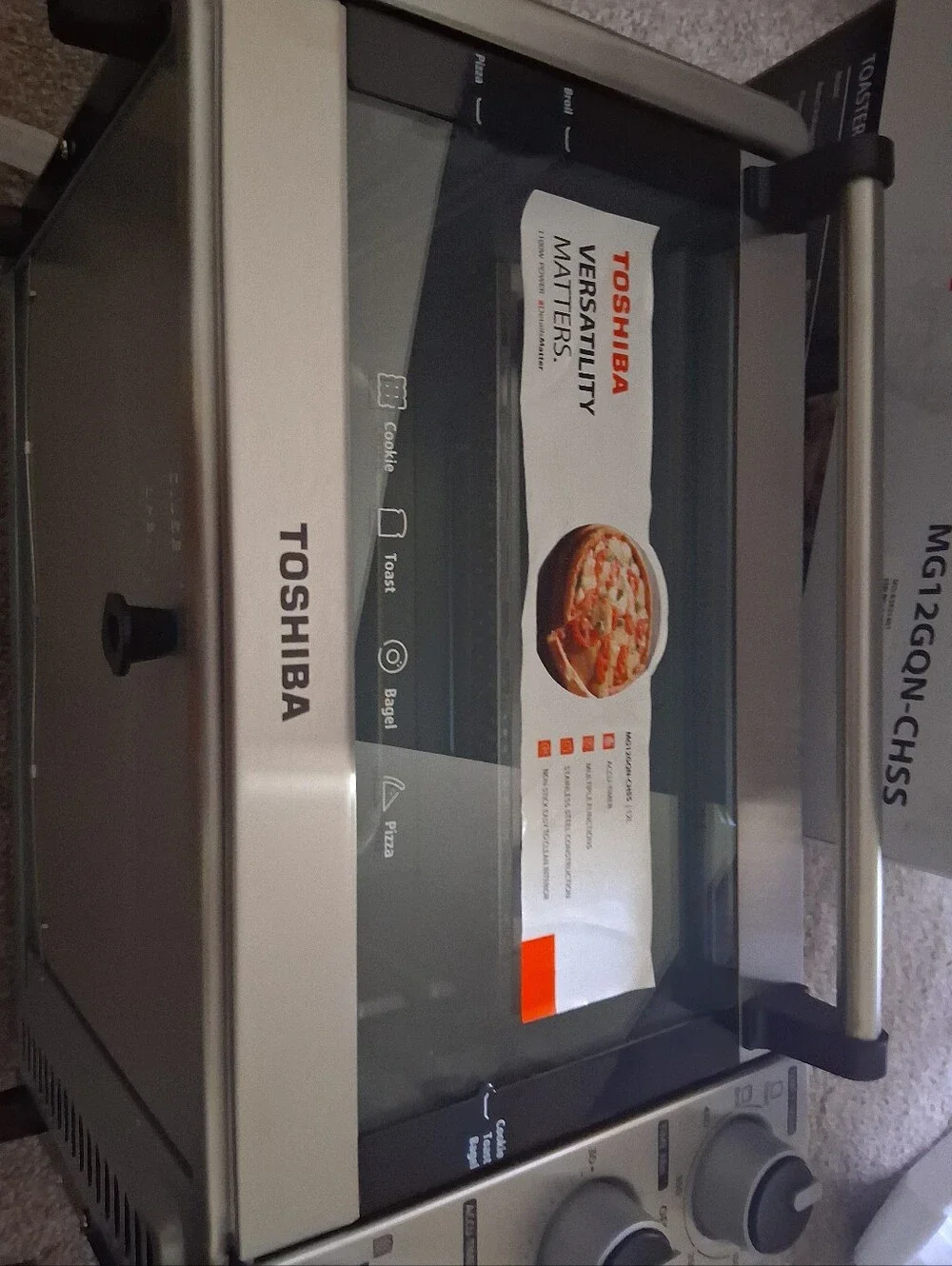 Toshiba Stainless Steel 4-Slice Toaster Oven with Adjustable Settings